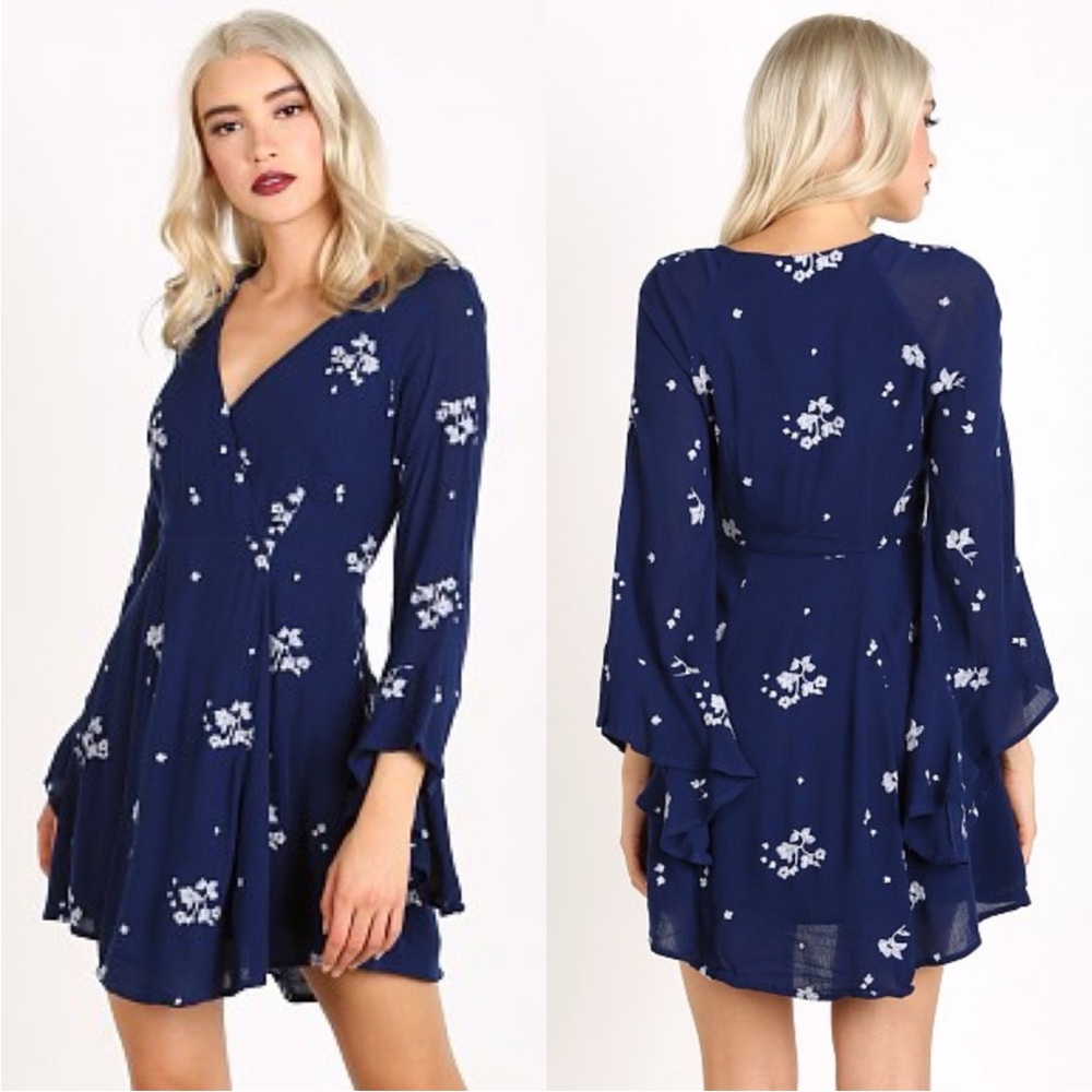 Free People / Jasmine mini dress 
Navy and White Floral Long Sleeve Dress